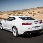 2016-Chevrolet-Camaro-RS-V-6-rear-three-quarter-in-motion