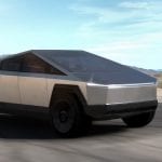 Tesla-Cybertruck-Electric-Pickup-Truck-Front-3-4-in-Motion-on-Road