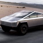 Tesla-Cybertruck-Electric-Pickup-Truck-Front-3-4-in-Motion-on-Road-Course